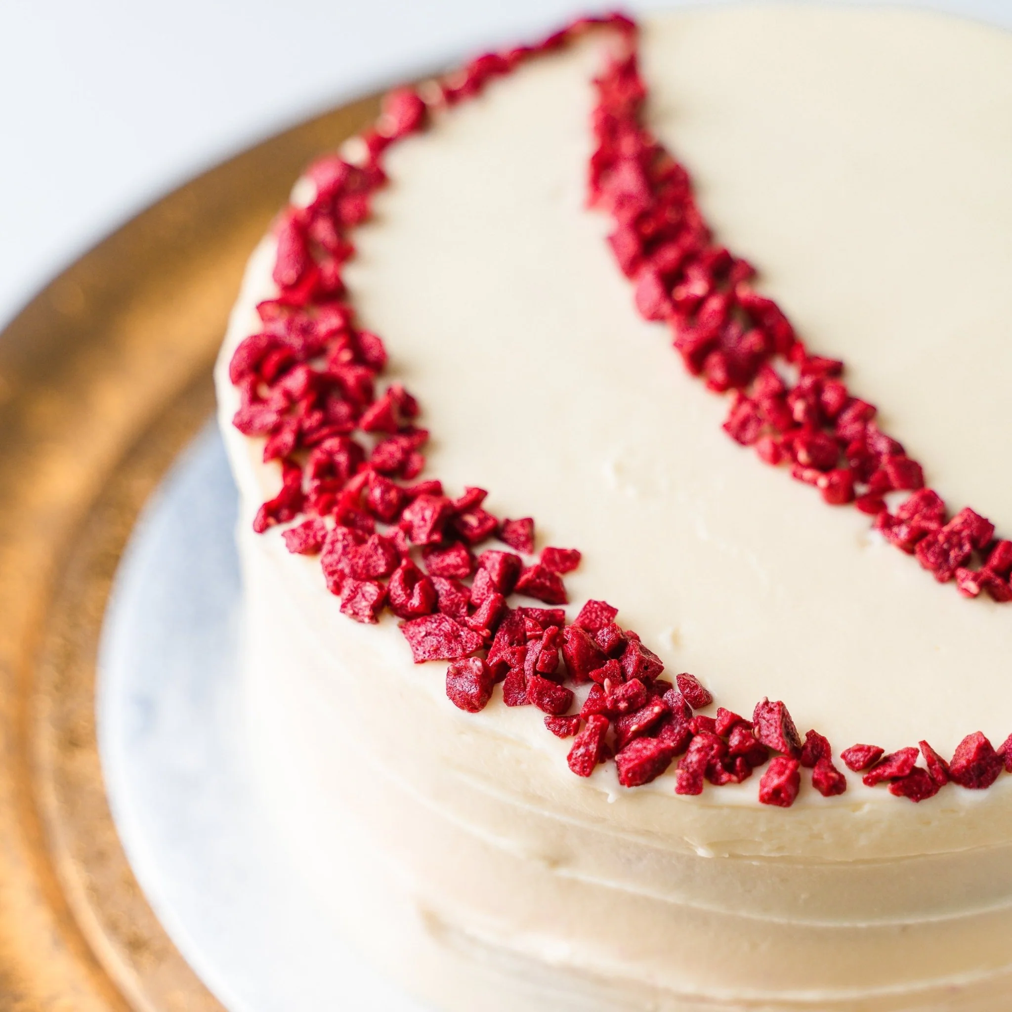 What is on top of the Red Velvet cake?