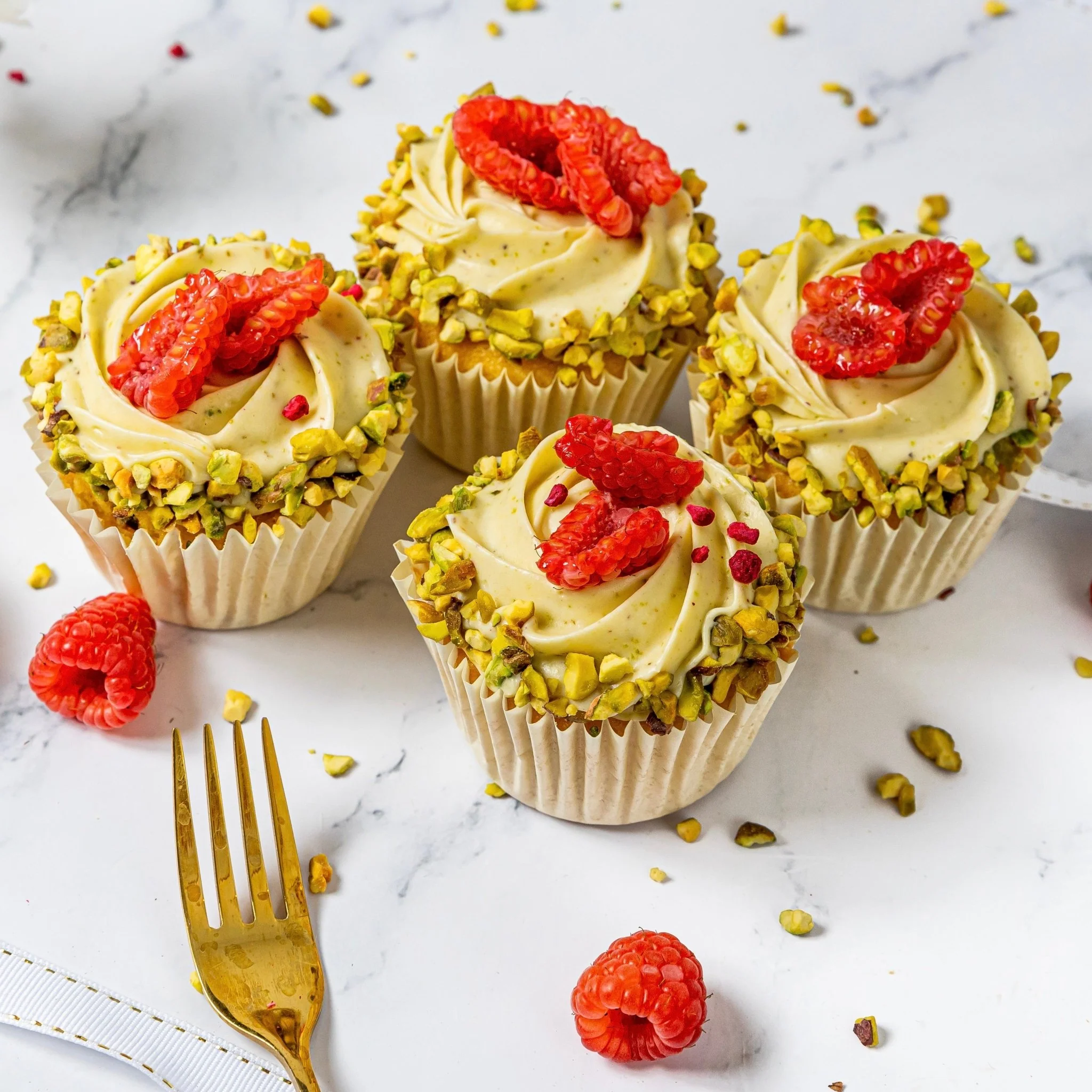 Raspberry and pistachio cup cakes