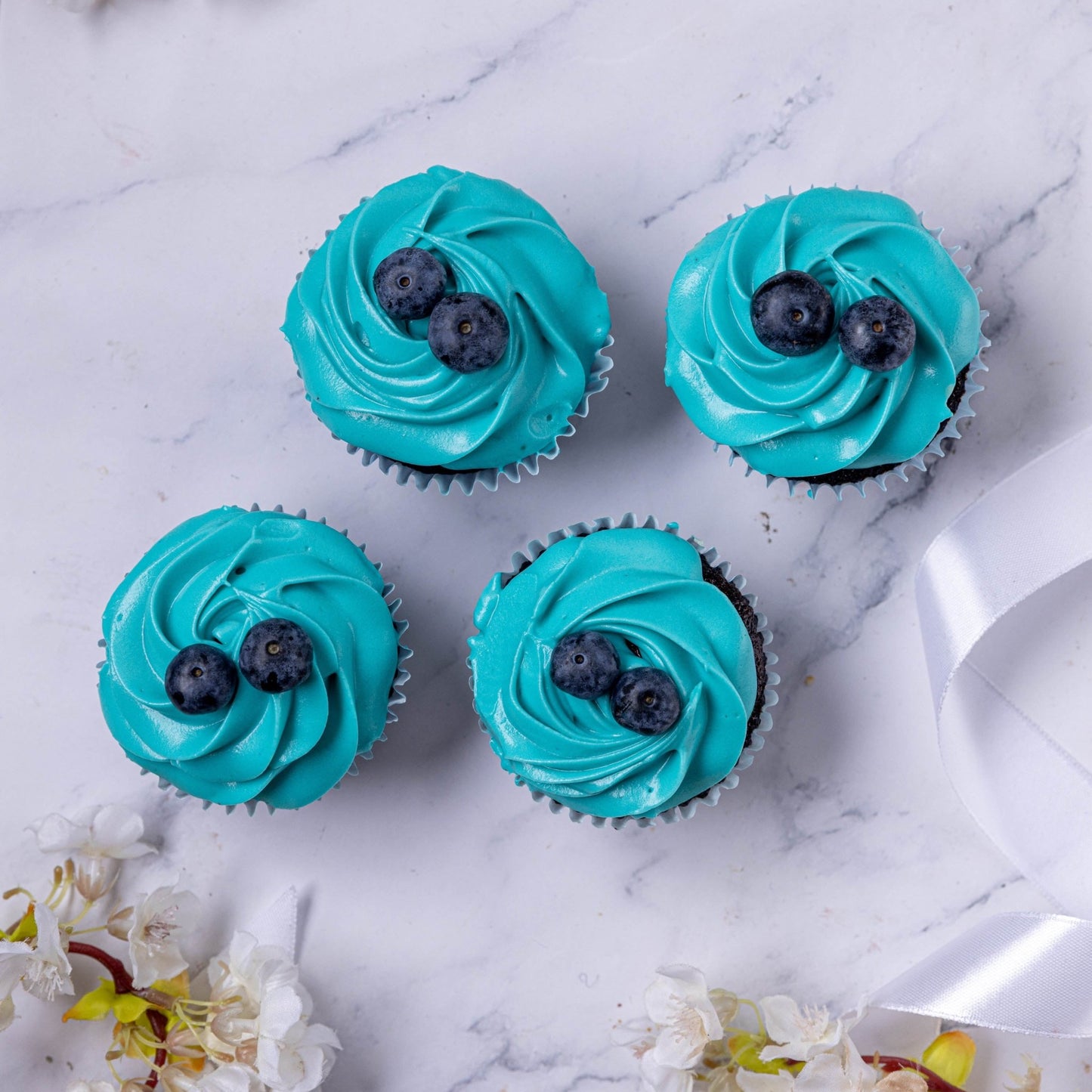 Blue Baby Shower Cupcakes - Jack and Beyond