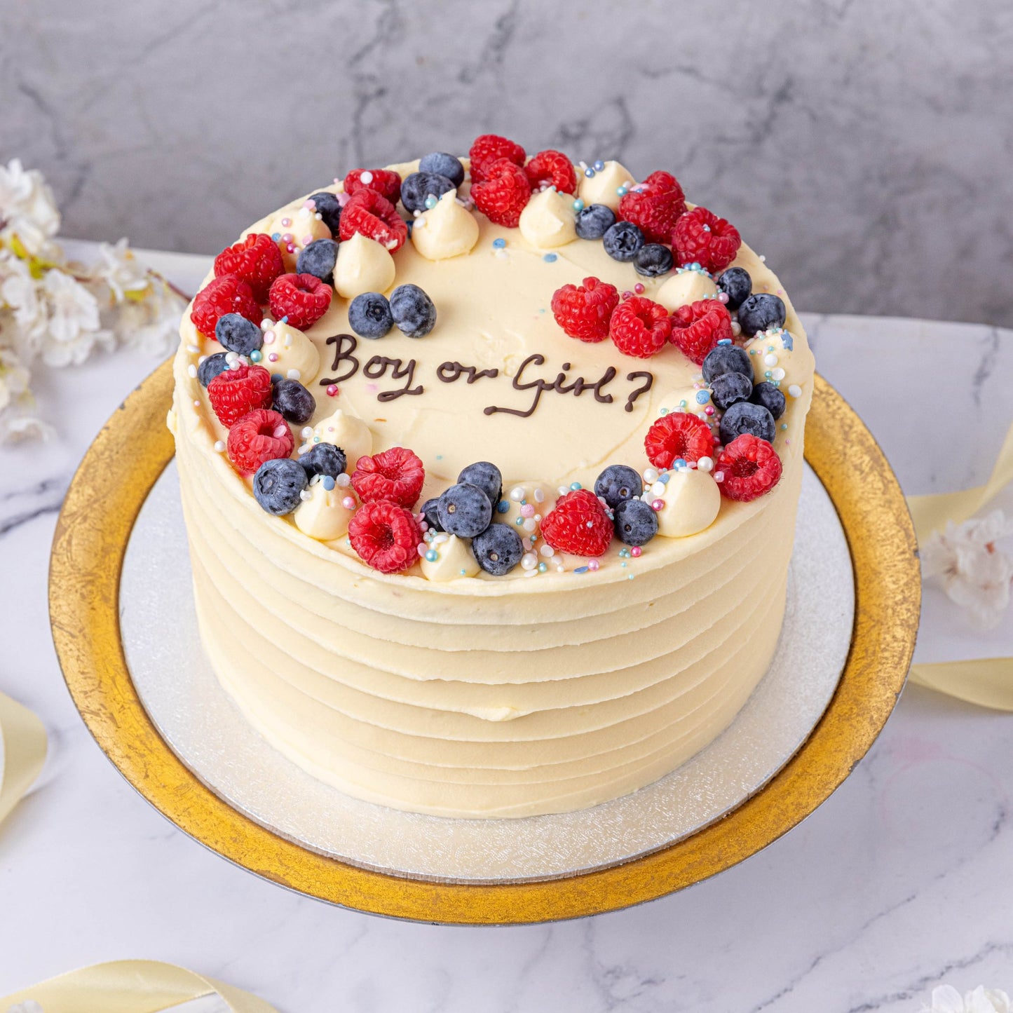 Gender Reveal Piñata Cake - Jack and Beyond