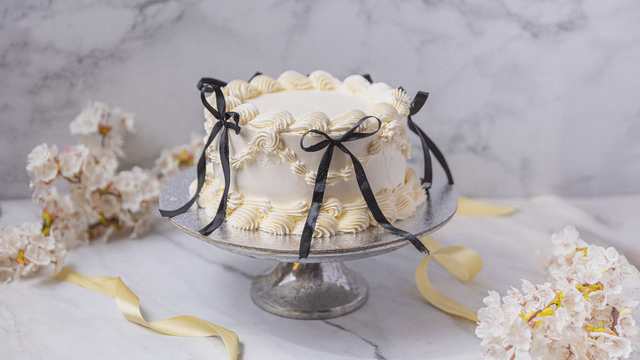 Load video: Lambeth Cake turning around