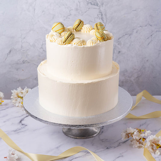 White Buttercream & Macarons Wedding Cake - Jack and Beyond