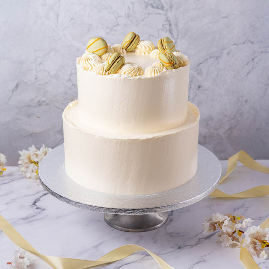 White Buttercream & Macarons Wedding Cake