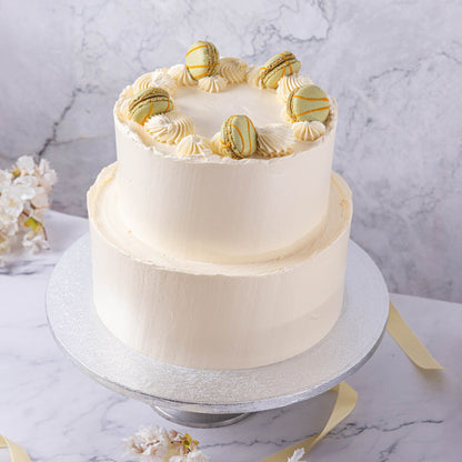White Buttercream & Macarons Wedding Cake - Jack and Beyond