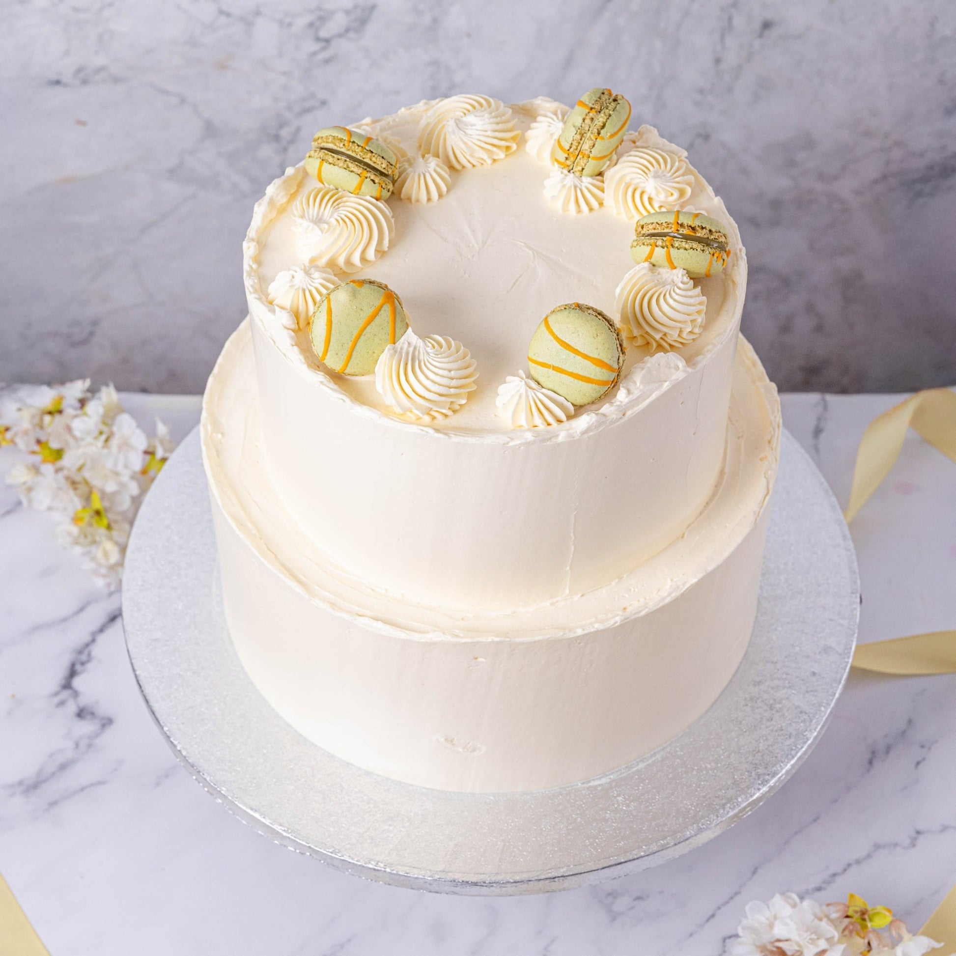 White Buttercream & Macarons Wedding Cake - Jack and Beyond