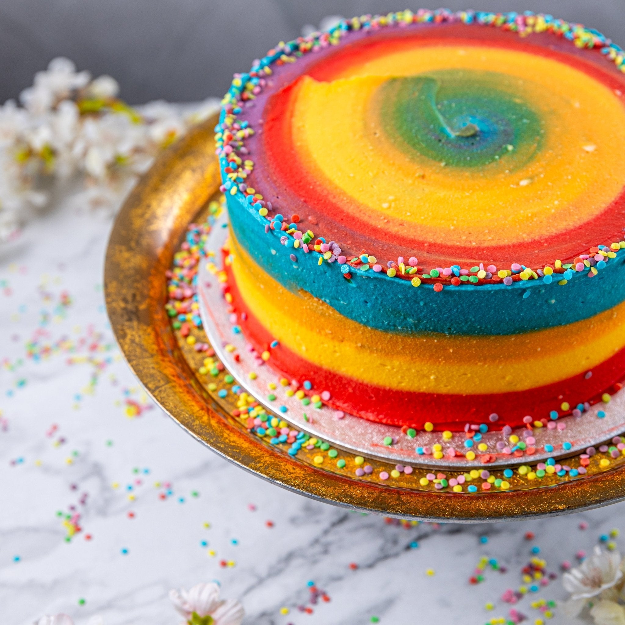 Rainbow Frosting Birthday Cake - Jack and Beyond